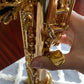 A right thumb placed into a saxophone thumb hook using the LAGAN wrist saver for soprano saxophone. 