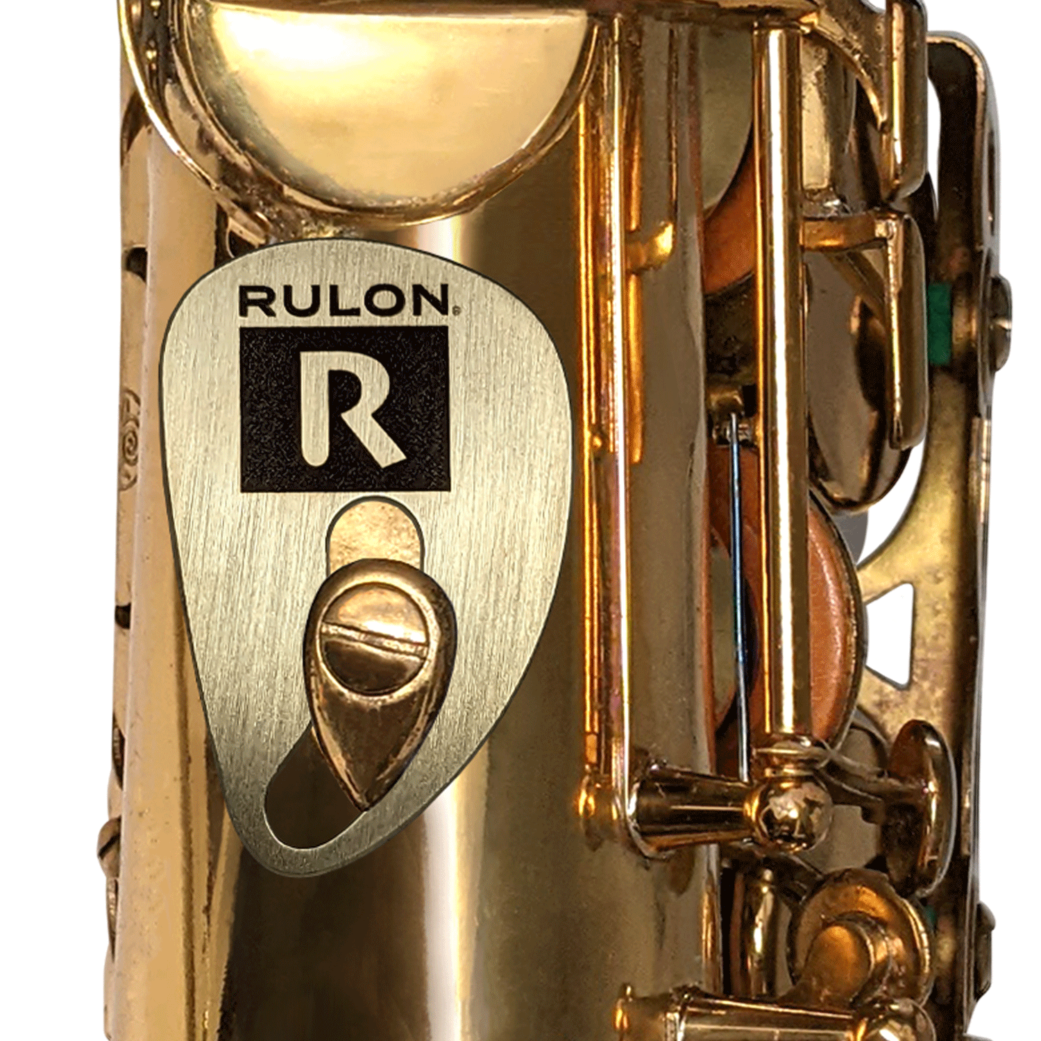 Raw brass saxophone rest designed by RULON BROWN. It replaces the right thumb hook of the saxophone and is adjustable to fit any hand size comfortably.