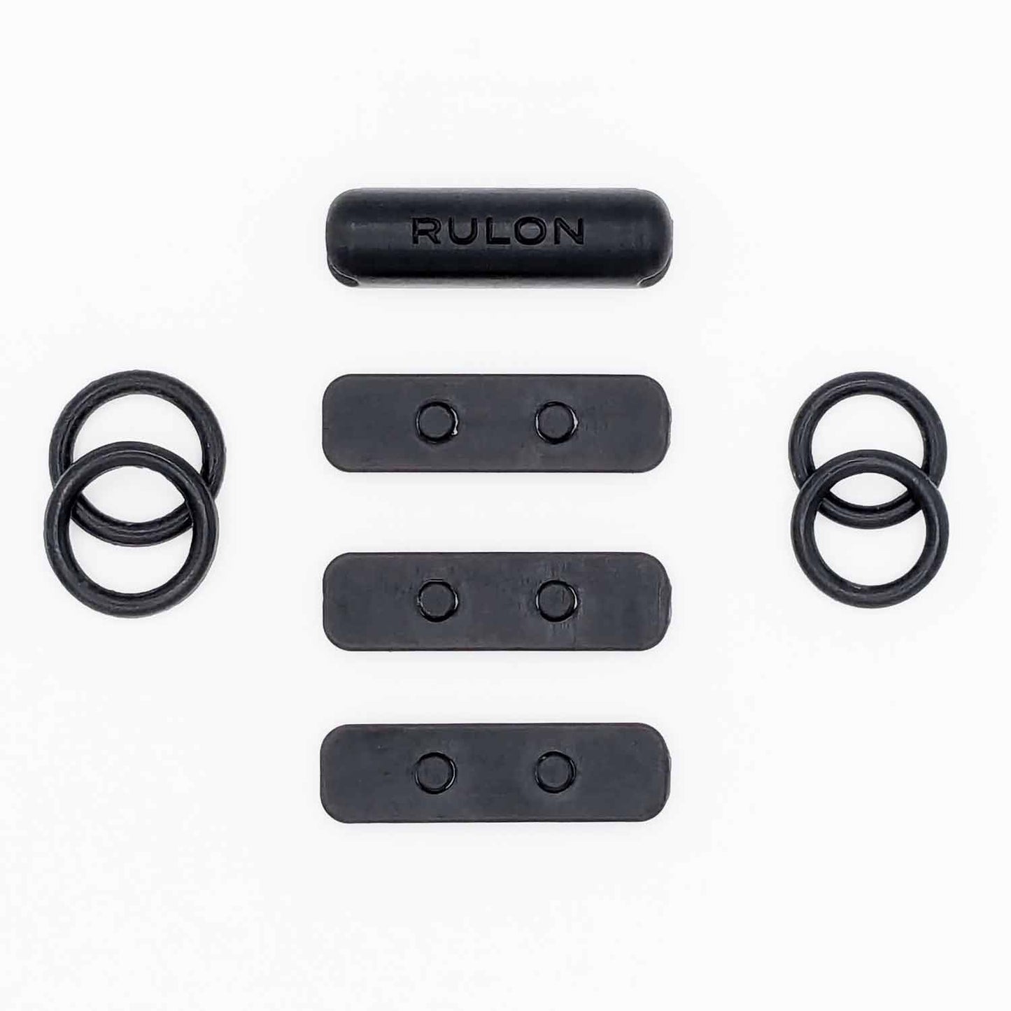 A photo showing the individual parts of the RULON Key Booster for Saxophone High F Sharp.