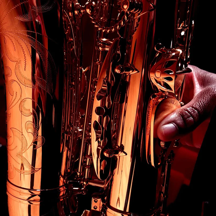 A close-up photo of the RULON saxophone thumb rest used on an alto saxophone.