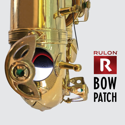 RULON Saxophone Bow Patch shown clos up through the E flat tone hole of a Selmer Mark VI tenor saxophone.