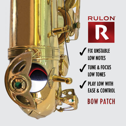 RULON Saxophone Bow Patch shown close up through the E flat tone hole of a Selmer Mark VI tenor saxophone. Also in the image are benefit text about how the RULON saxophone bow patch helps fix unstable low notes, tune and focus low tones, and help sax players play low with more ease and control.