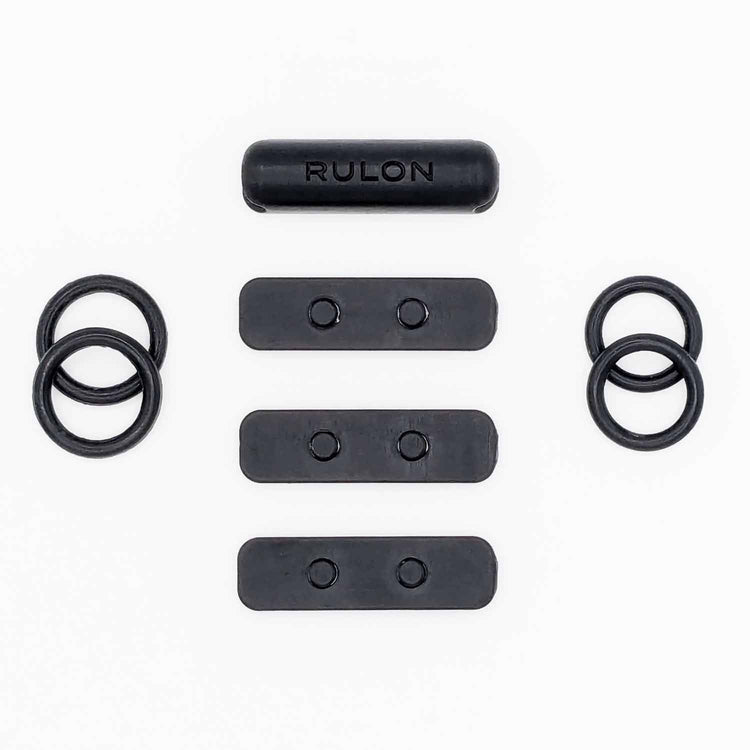 A photo showing the individual parts of the RULON Key Booster for Saxophone High F Sharp.