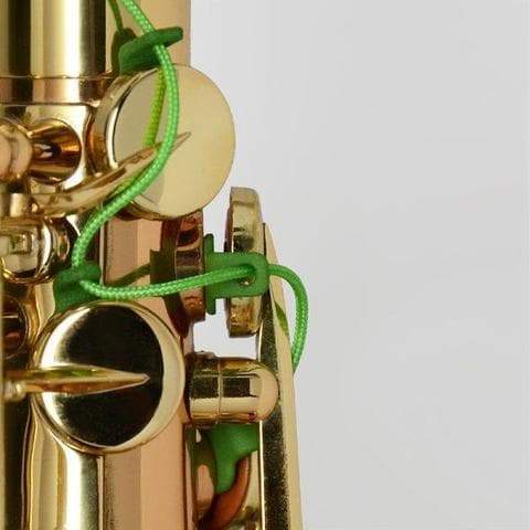Close up view of Key Leaves Vent Vine™ on the saxophone palm keys. It stops sticky sax keys and helps keeps the saxophone cleaner.