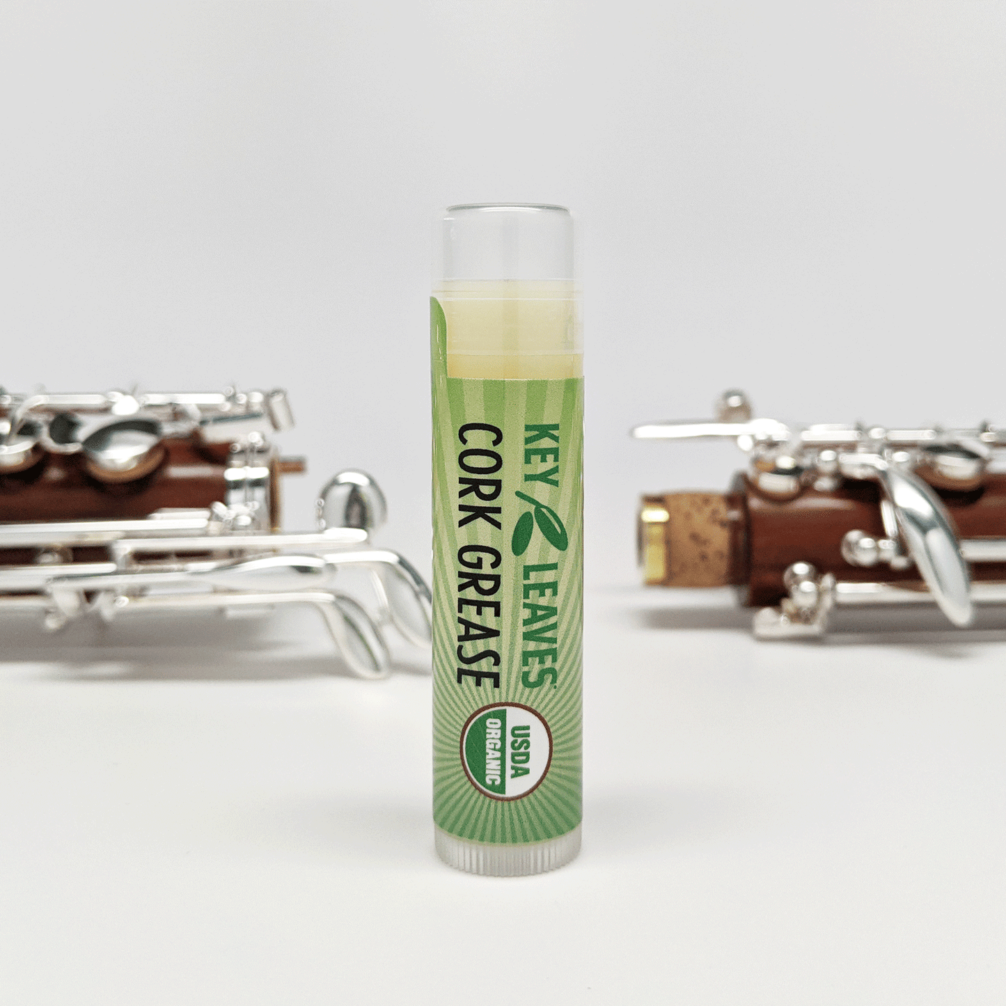 Key Leaves brand Cork Grease is USDA Organic Certified for use on clarinet, saxophone, oboe and other musical instruments with cork connections. The cork grease is shown here between the upper and lower joint of a rosewood oboe.