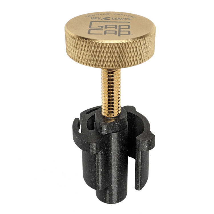A gold plated GapCap® saxophone end plug that helps protect the octave key and sax body from damage inside the case.