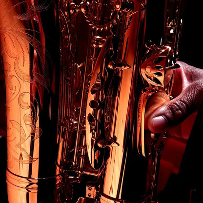 A close-up photo of the RULON saxophone thumb rest used on an alto saxophone.